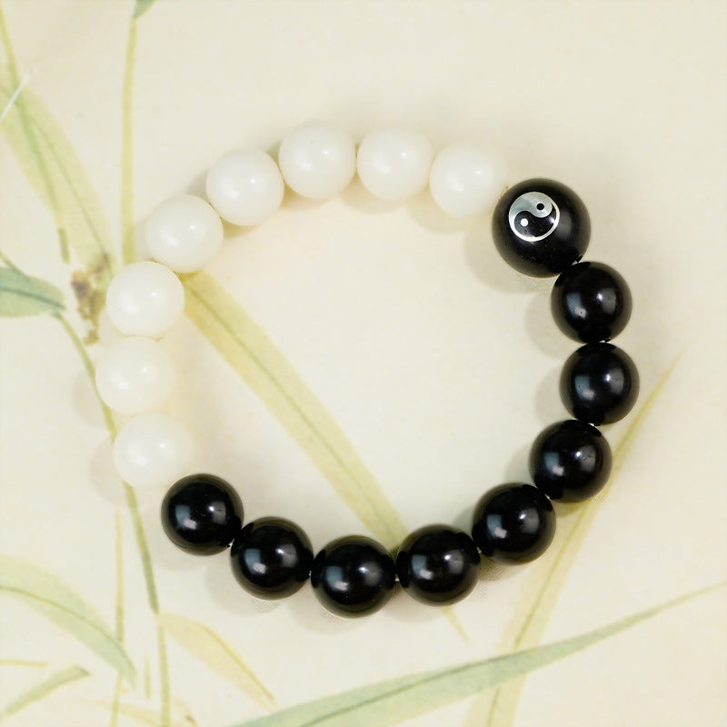 Purple sandalwood inlaid with silver Yin-Yang Tai Chi Taoist flowing beads bracelet, white jade Bodhi ebony inlaid Yin-Yang fish bracelet