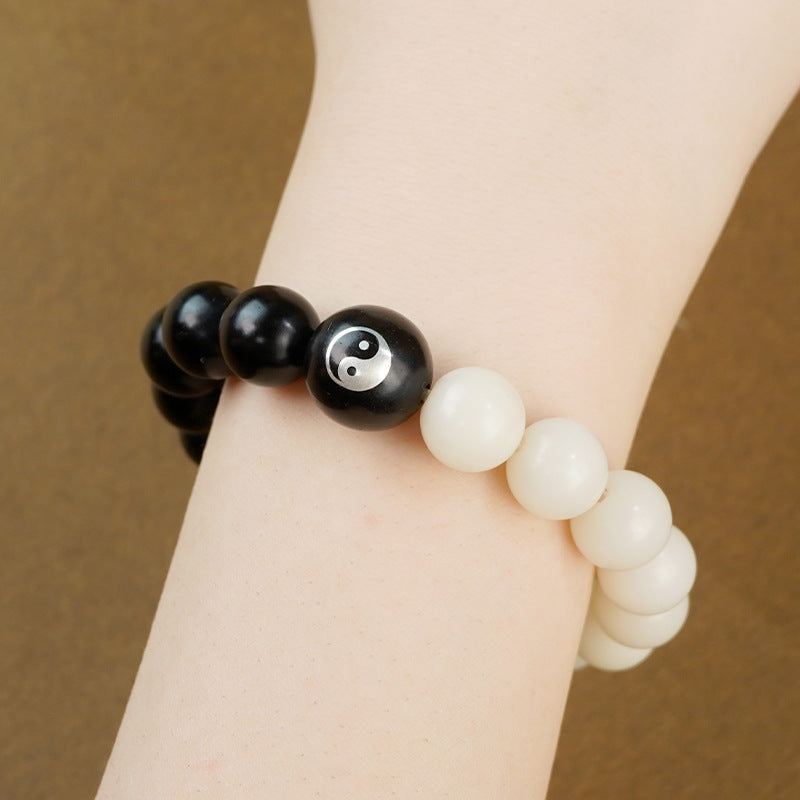 Purple sandalwood inlaid with silver Yin-Yang Tai Chi Taoist flowing beads bracelet, white jade Bodhi ebony inlaid Yin-Yang fish bracelet