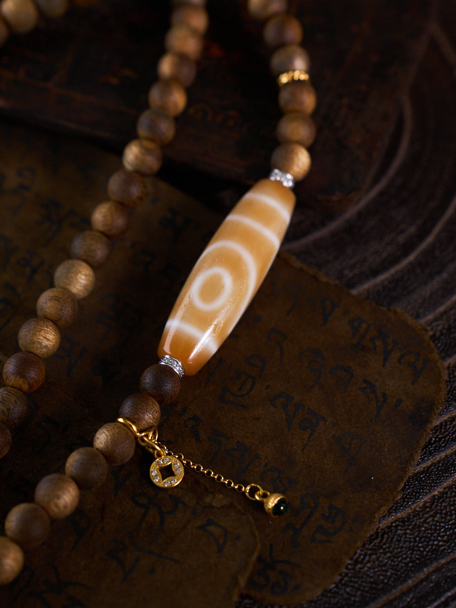 Dual Harmony of Love & Prosperity – Two-Eyed Dzi Bead Agarwood 108 Mala Necklace