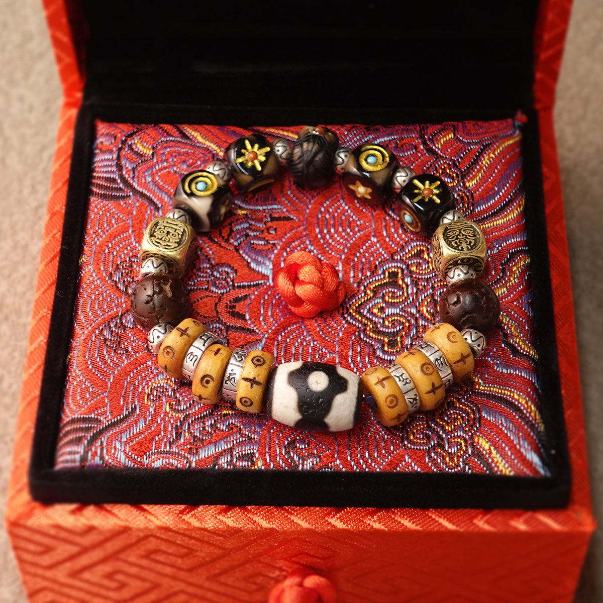 Carved Dzi Bone Cinnabar Sterling Silver Charm Bracelet