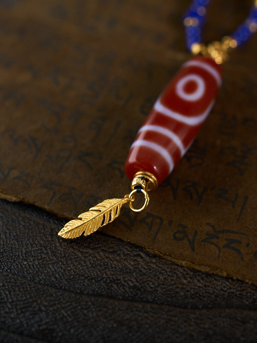 Dual Blessings of Wealth & Harmony – Two-Eyed Cinnabar Dzi Bead Lapis Lazuli Necklace