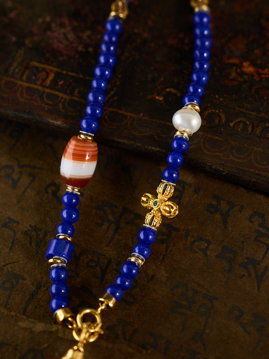 Dual Blessings of Wealth & Harmony – Two-Eyed Cinnabar Dzi Bead Lapis Lazuli Necklace