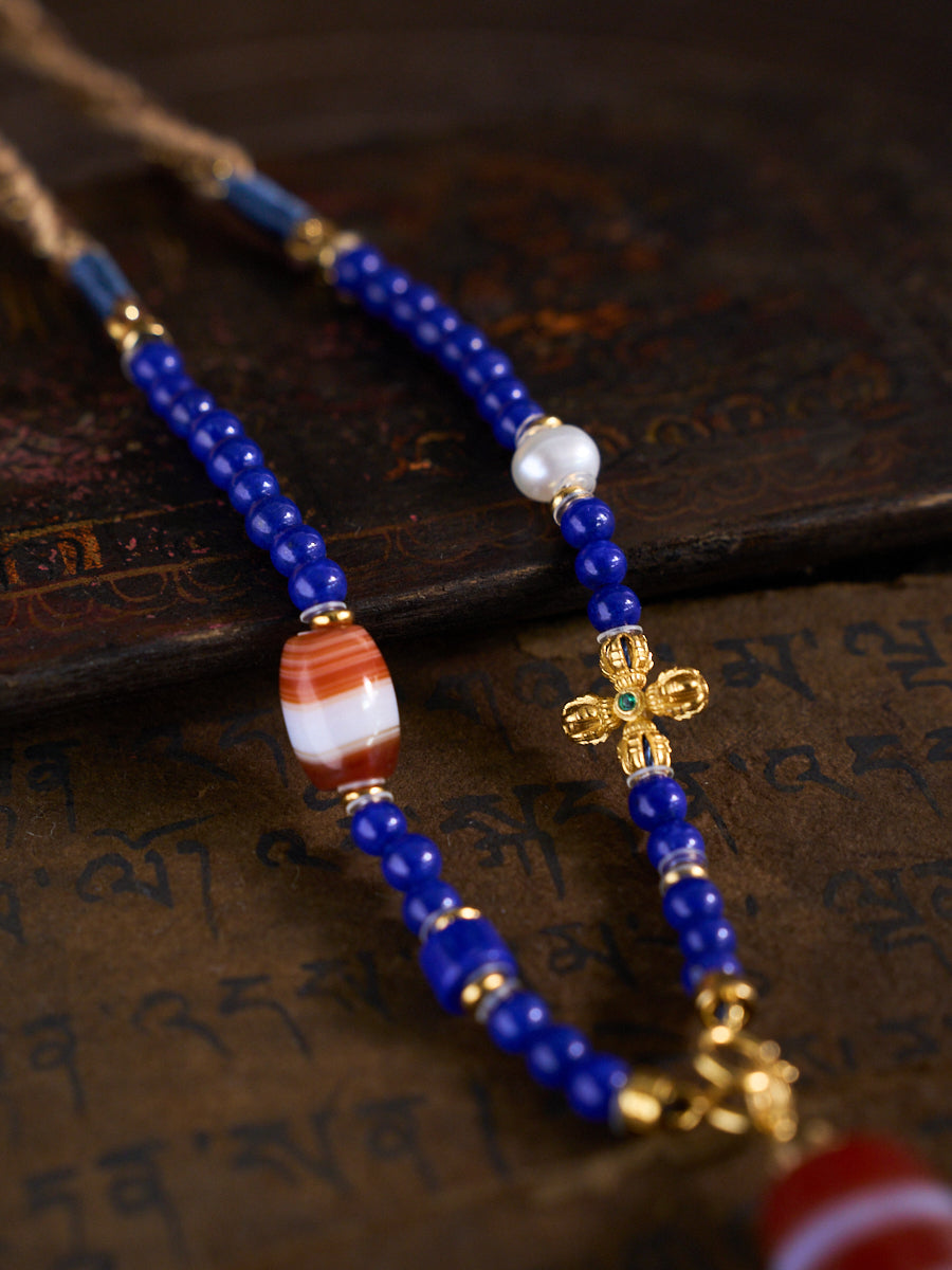 Dual Blessings of Wealth & Harmony – Two-Eyed Cinnabar Dzi Bead Lapis Lazuli Necklace
