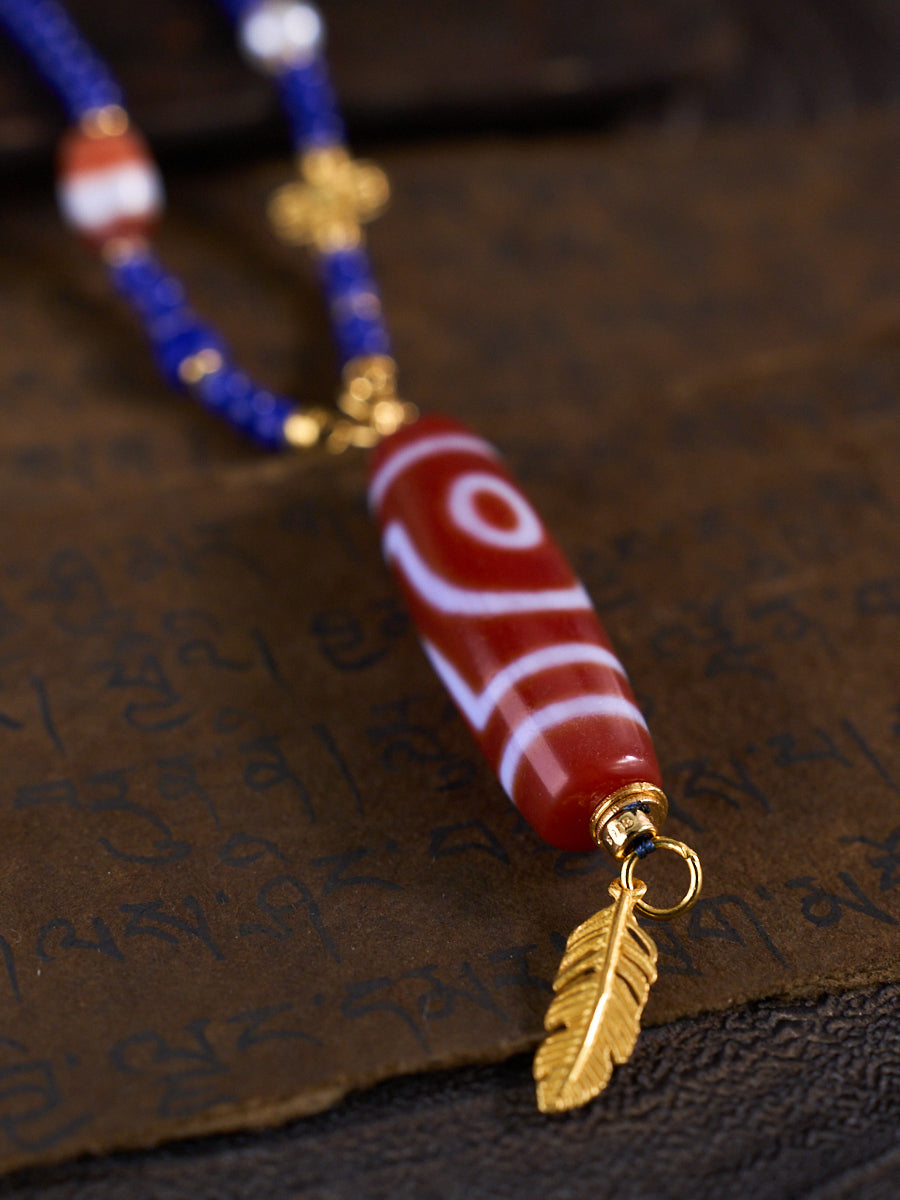 Dual Blessings of Wealth & Harmony – Two-Eyed Cinnabar Dzi Bead Lapis Lazuli Necklace