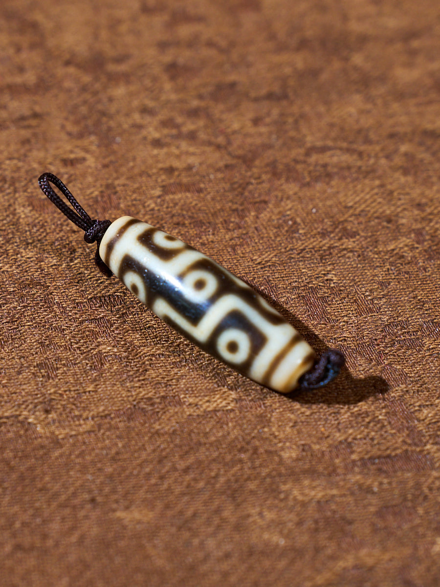 Ninefold Convergence · One-of-a-Kind Nine-Eyed Dzi Bead