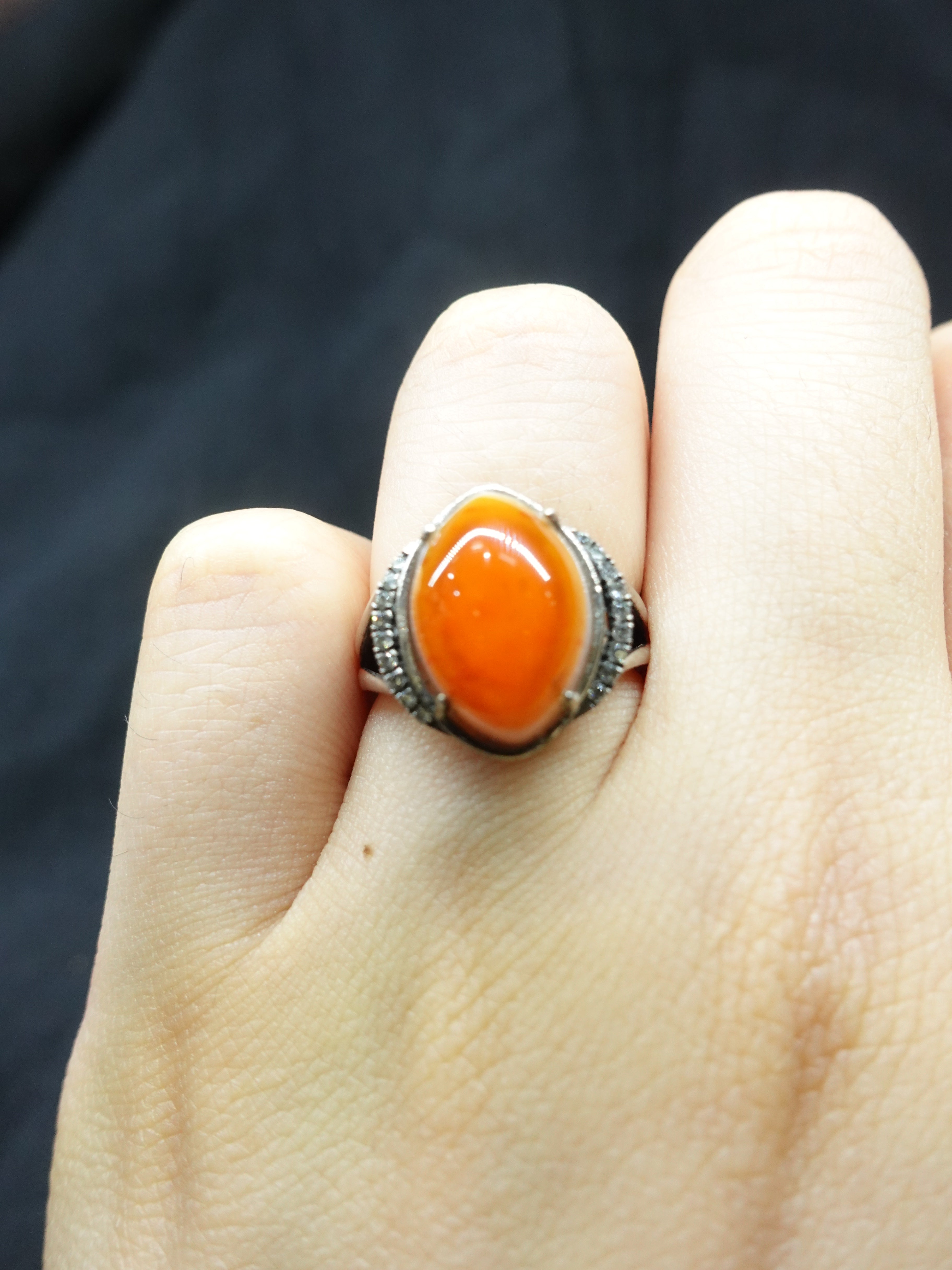 Diamond-encrusted eye-shaped South Red ring