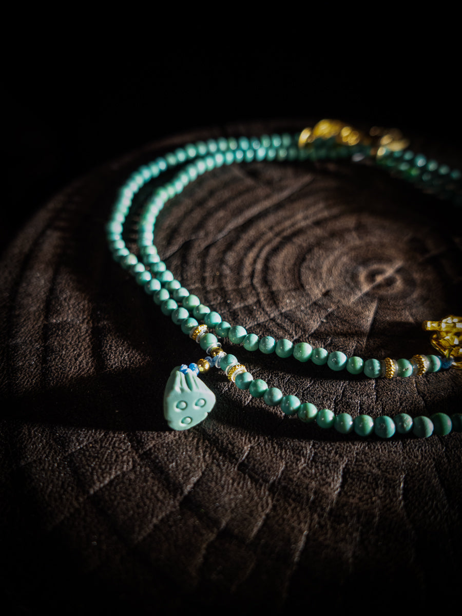 Healing through Stillness Turquoise Gold Necklace