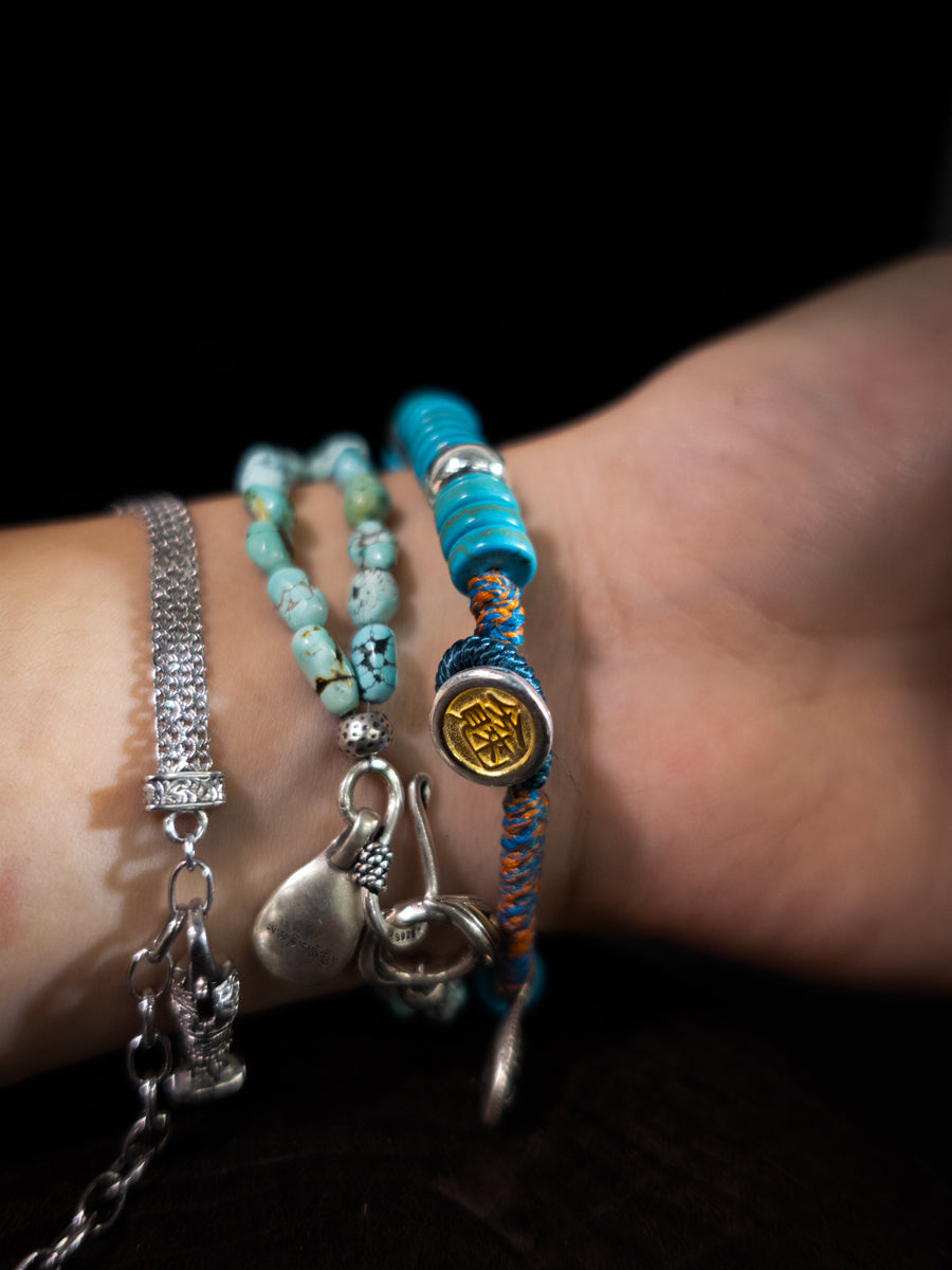 Disc Stack Turquoise Sterling Silver Braided Bracelet