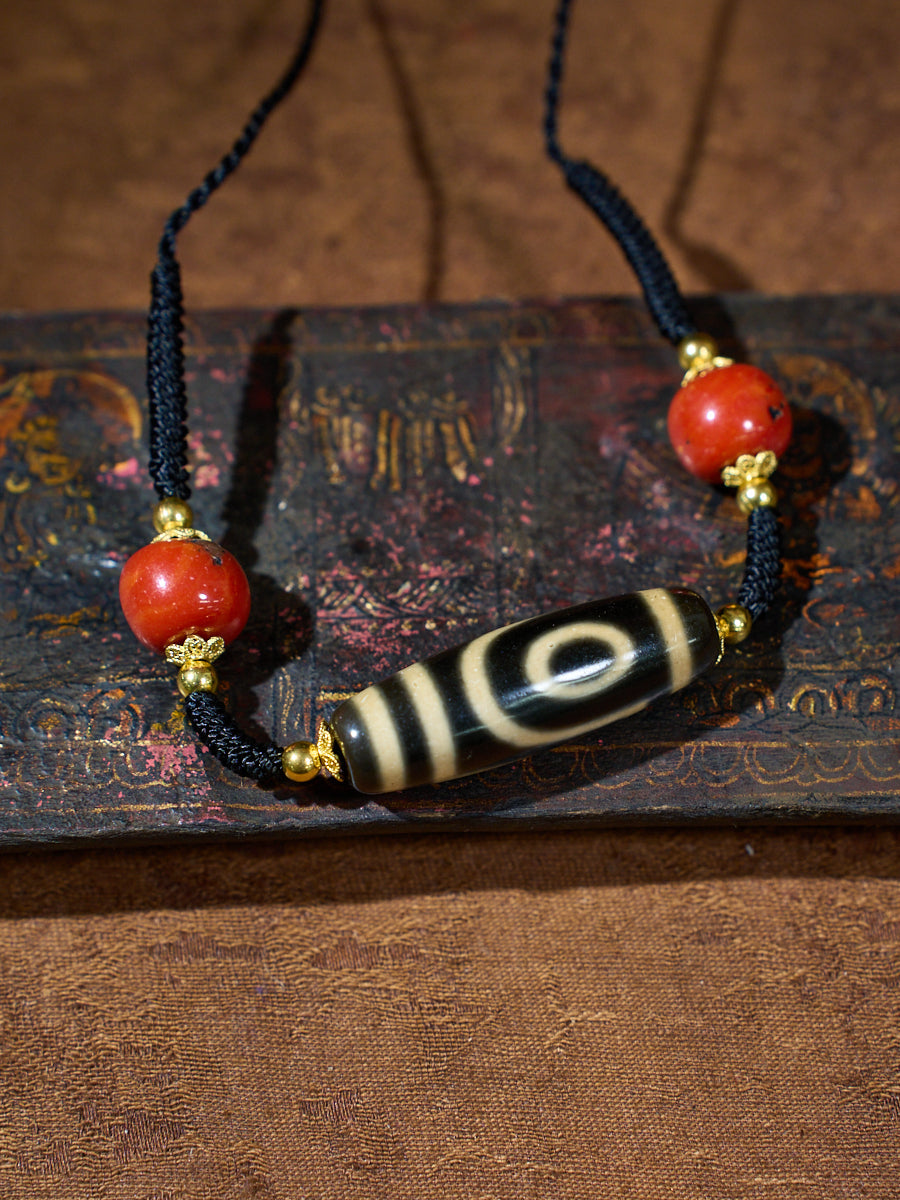 Ancient Clearing · Two-Eyed Dzi & Coral Necklace