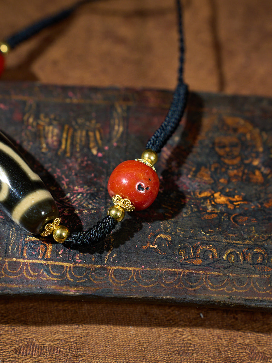 Ancient Clearing · Two-Eyed Dzi & Coral Necklace