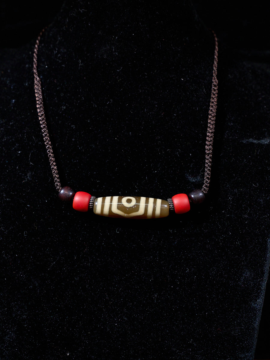 Three-Eyed Dzi Bead Necklace – Tibetan Symbol of Protection & Spiritual Balance