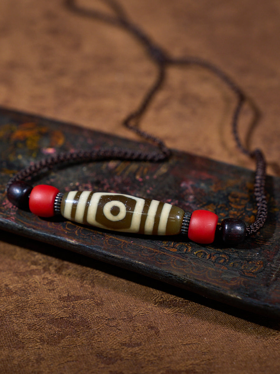Three-Eyed Dzi Bead Necklace – Tibetan Symbol of Protection & Spiritual Balance