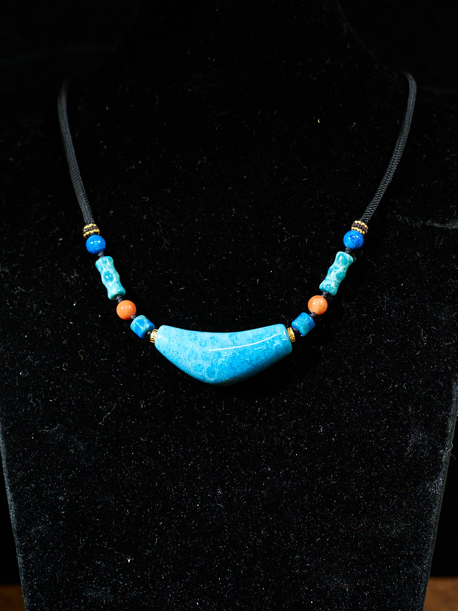 Lapis Quiet · Arc Agatized Corale Necklace