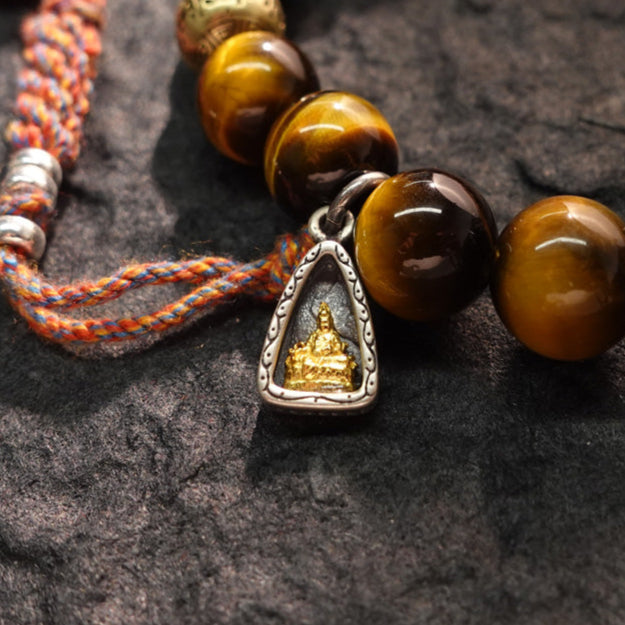 Wealth & Strength Tiger's Eye Bracelet with Gold Buddha Charm