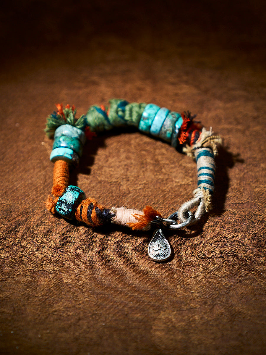 Wrapped Earth Turquoise Sterling Silver Charm Bracelet