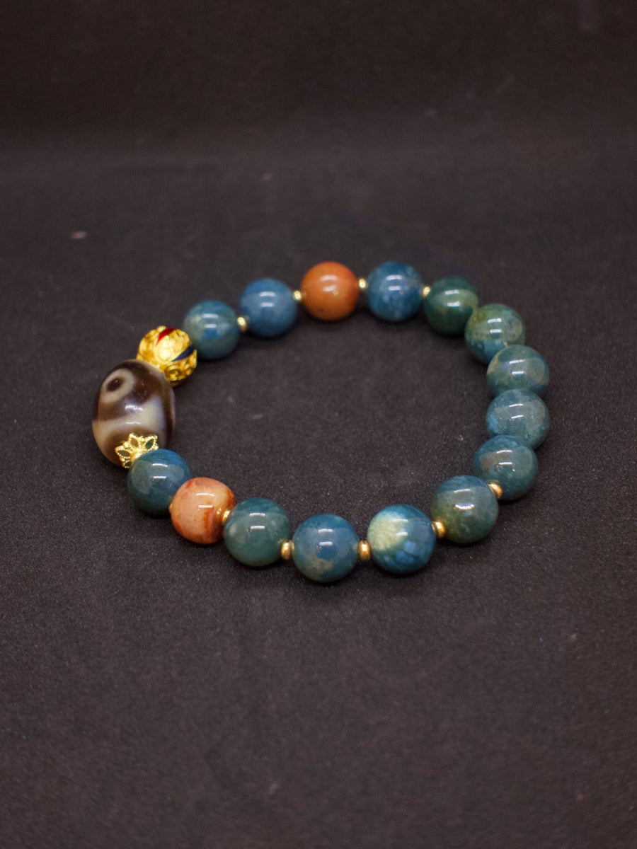 Agatized Coral Three-Eyed Dzi Bead Silver Energy Bracelet