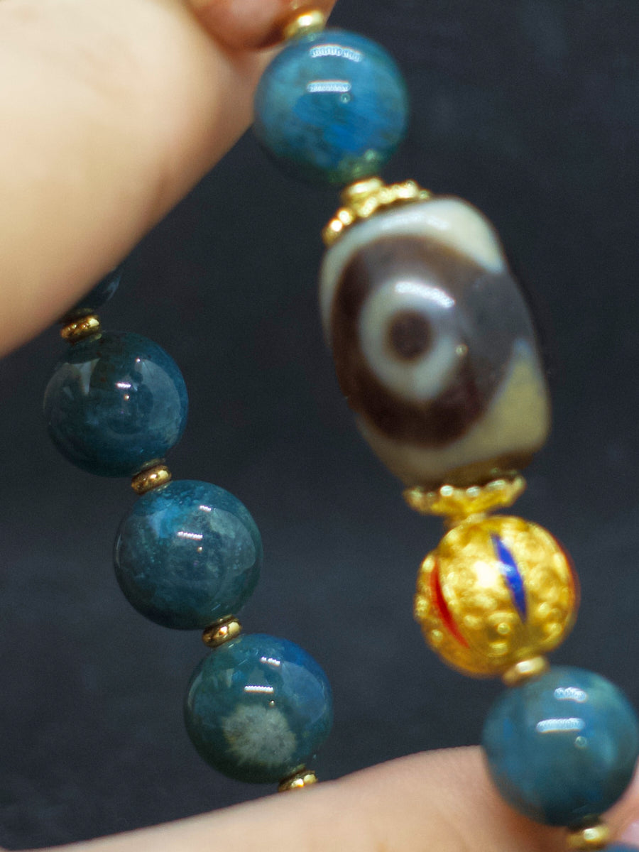 Agatized Coral Three-Eyed Dzi Bead Silver Energy Bracelet