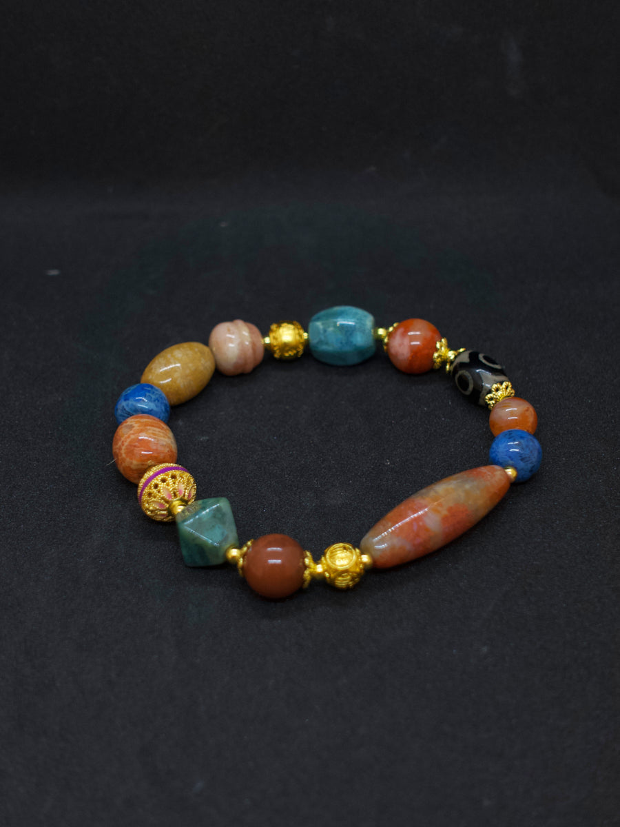 Agatized Coral Wisdom Guardian Three-Eyed Dzi Silver Energy Bracelet