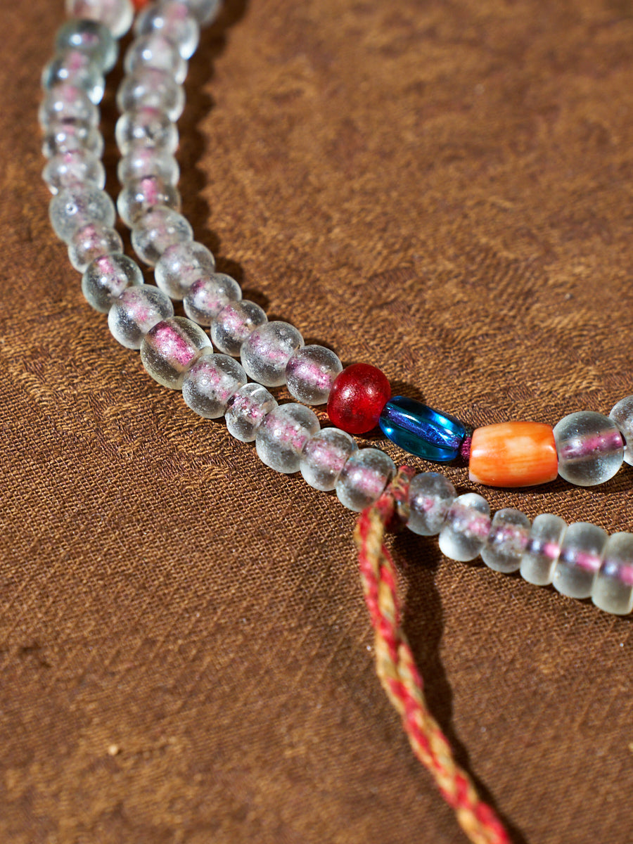 Silent Light of Devotion · Old Tibetan Colored Glaze Bracelet