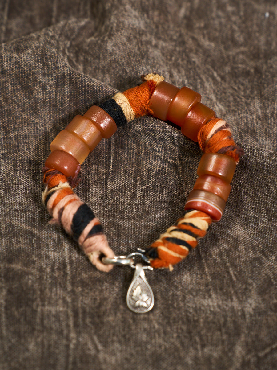 South Red Agate Tibetan Thread Silver Charm Bracelet
