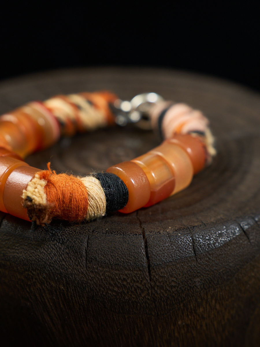 South Red Agate Tibetan Thread Silver Charm Bracelet