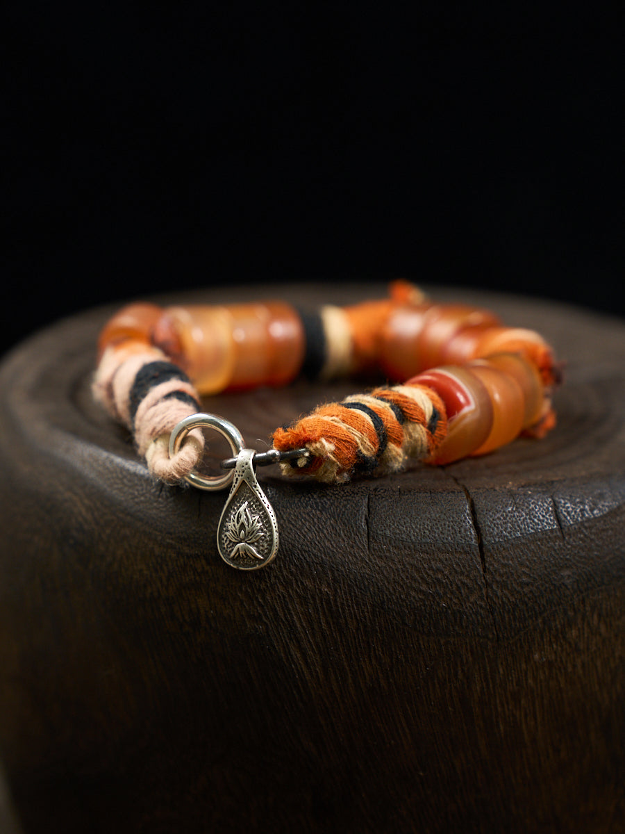South Red Agate Tibetan Thread Silver Charm Bracelet