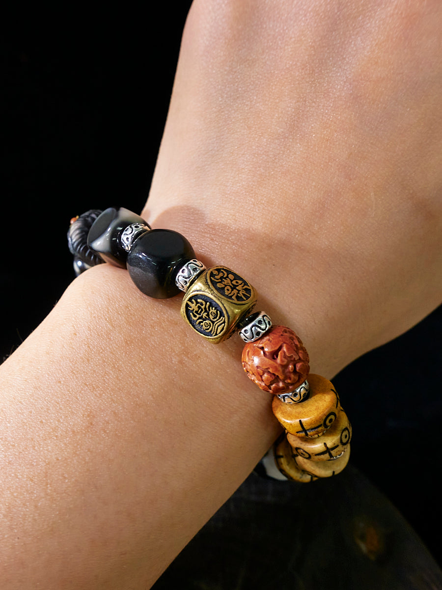 Carved Dzi Bone Cinnabar Sterling Silver Charm Bracelet