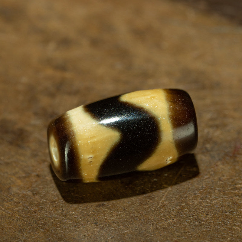 Tibetan Ancient Tiger Tooth Dzi Bead – Grade A Ivory Yellow, Nine-Eye Shale, Perfect Calcification