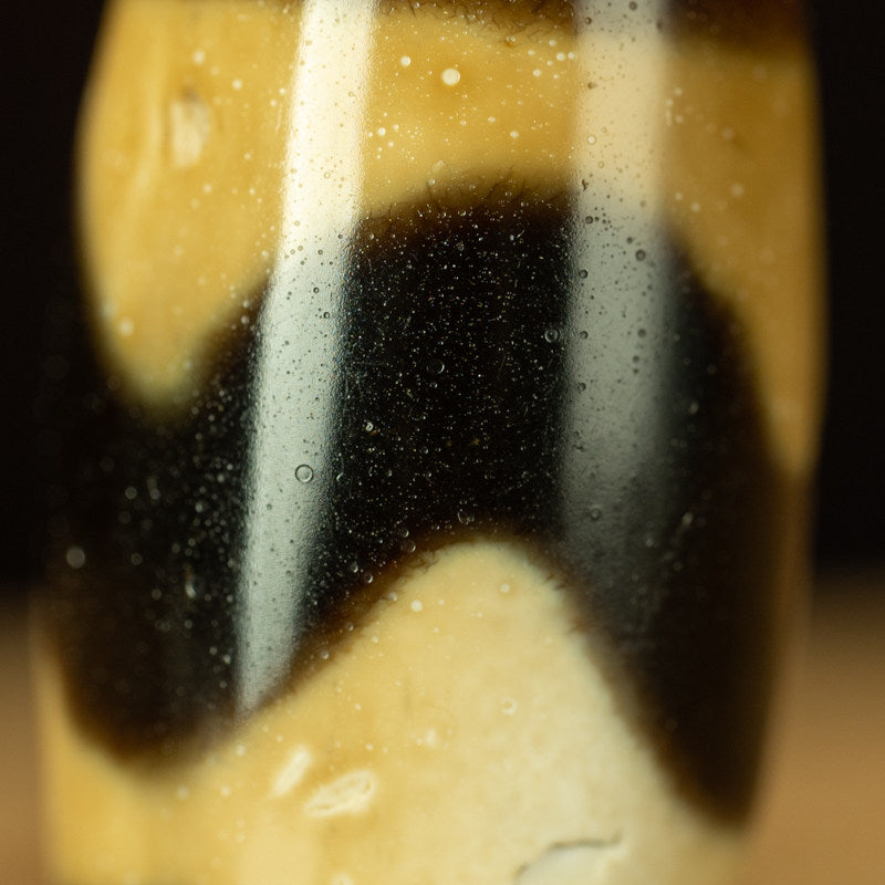 Tibetan Ancient Tiger Tooth Dzi Bead – Grade A Ivory Yellow, Nine-Eye Shale, Perfect Calcification