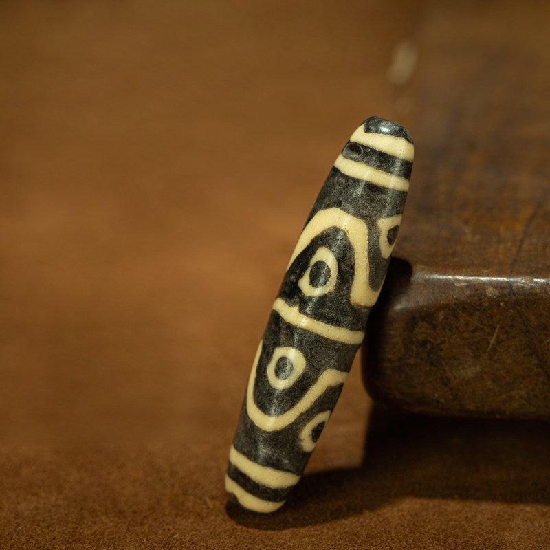 Qing Dynasty Tibetan Upper Tantric College Eight-Eye Dzi Bead – Gyütö Monastery Ritual Glass Bead