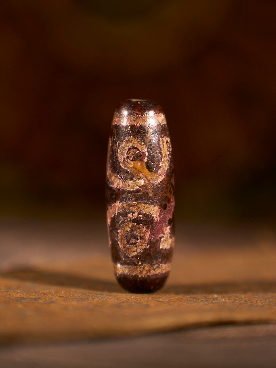 Tibetan Zhangzhung Era Three-Eyed Treasure Canopy Agate Dzi Bead