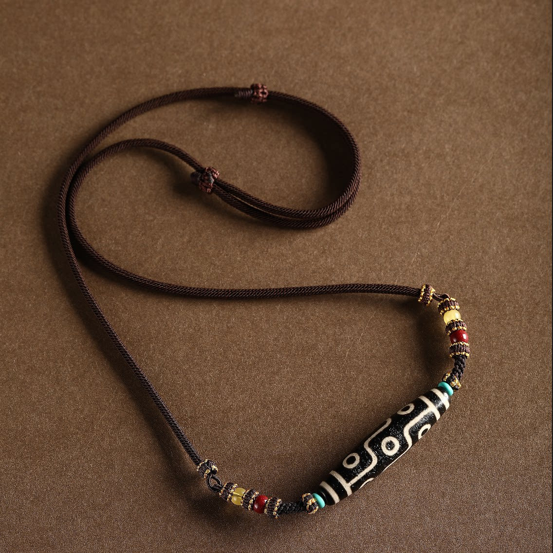 Sacred Nine-Eye Dzi Bead Cotton Cord Necklace
