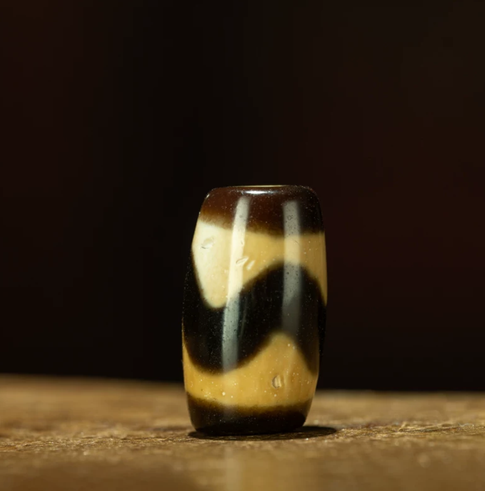 Tibetan Ancient Tiger Tooth Dzi Bead – Grade A Ivory Yellow, Nine-Eye Shale, Perfect Calcification
