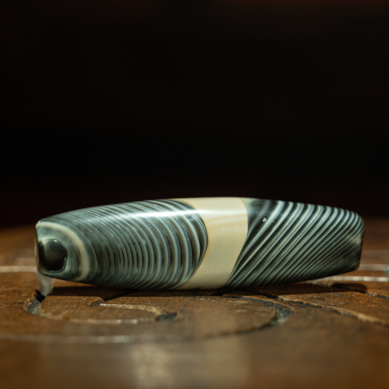 Tibetan Millennium Grey-Skin Blue-Soaked Buddha-Eye Qiong Banded Agate Bead – Ming Dynasty Stupa Relic